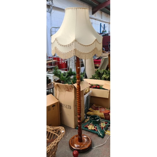 544 - A wonderful tall floor standing lamp with barley twist base and cream shade with tassled edge. very ... 