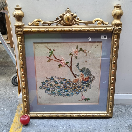 669 - A charming vintage hand embroidered artwork featuring a peacock and a cherry blossom. Housed in a ve... 