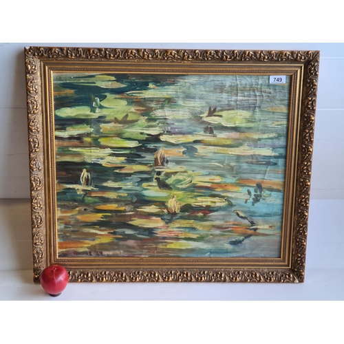 749 - A lovely original oil on canvas painting featuring an abstracted depiction of lily pads reflecting o... 