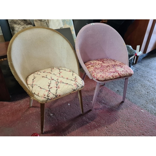 769 - A pair of Sirrom branded vintage bedroom chairs. Two lovely rattan Loom style chairs in varying fini... 