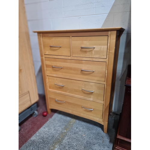 792 - A very lovely, chest of five drawers. In a solid honey Birch with curved, brushed chrome handles. H1... 