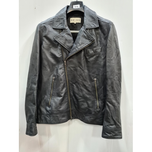 818 - A Reiss 100% genuine sheep leather jacket, with three pockets to front and breast pocket to interior... 