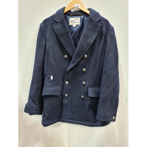 819 - A Reiss 1971 double breasted jacket in a dark blue fabric with two pockets to front. Size L Similar ... 