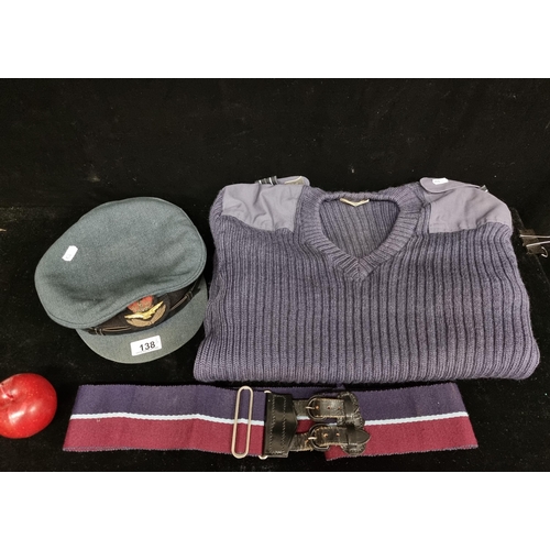 138 - A vintage  period RAF flight lieutenant's jersey, cap and belt. Invery  good condition.