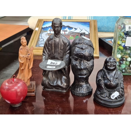 862 - Four vintage figures including a hand carved rosewood Chinese female example with excellent detail a... 