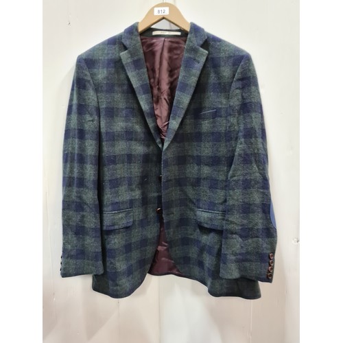 812 - A men's wool blazer by Baumler in a very stylish navy blue and green check with wooden buttons and p... 