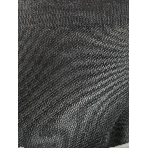 888 - A large bolt of brand new cotton blend fabric with no stretch. In black and in original plastic wrap... 