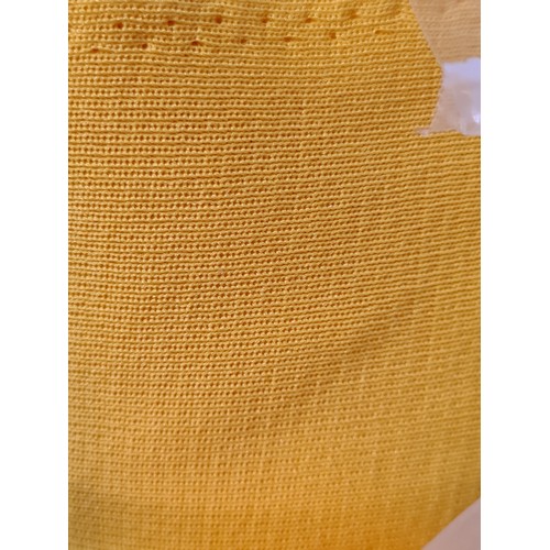 889 - A large bolt of sunflower yellow stretch fabric. This fabric is finely ribbed with excellent stretch... 