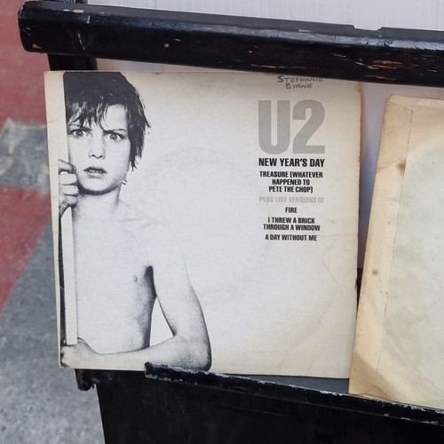 594 - A box containing 48 vintage vinyl singles, including examples by U2 x 2, The Human League, Jimmy Som... 