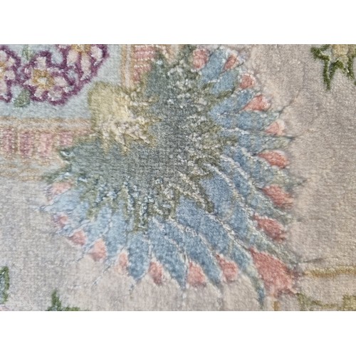 134 - Super Star Lot - A magnificent, hand-made, Iranian silk and wool rug. Crafted by Grutman. This beaut... 