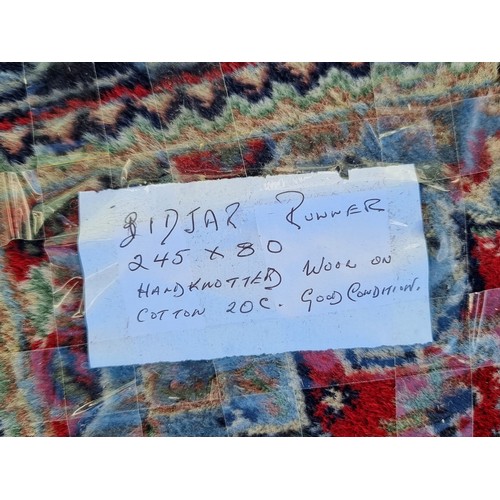 776 - Star Lot: A fabulous Bidjar Persian hand made, hand knotted, hall runner rug made of hand knotted wo... 