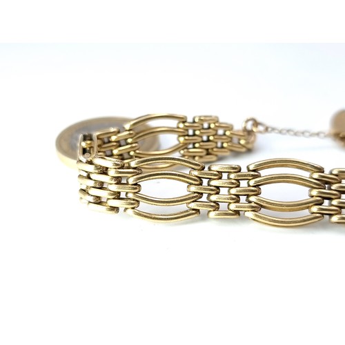 440 - Star lot : A very attractive heavy vintage 9 carat Gold padlock and link chain bracelet. With attach... 