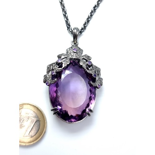 449 - Star Lot An exceptional natural Amythyst and Diamond pendant, with a stone weight of 56.70 carats an... 