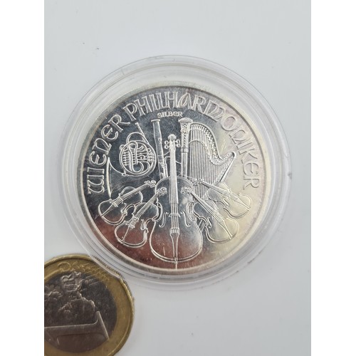 401 - A Republic of Austria one ounce .999 fine silver 1.5 euro coin, dated 2014. Presented in a protectiv... 