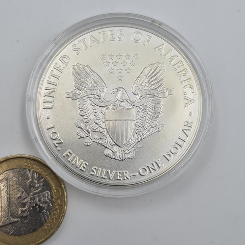 402 - A United States of America .999 one ounce fine silver one dollar coin, dated 2020.  Presented in a p... 