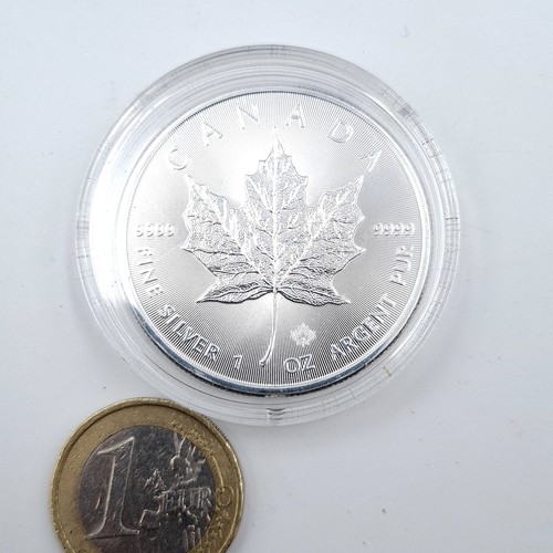 405 - A Queen Elizabeth II Canadian five dollar sterling silver one ounce coin. Dated 2020. Presented in a... 