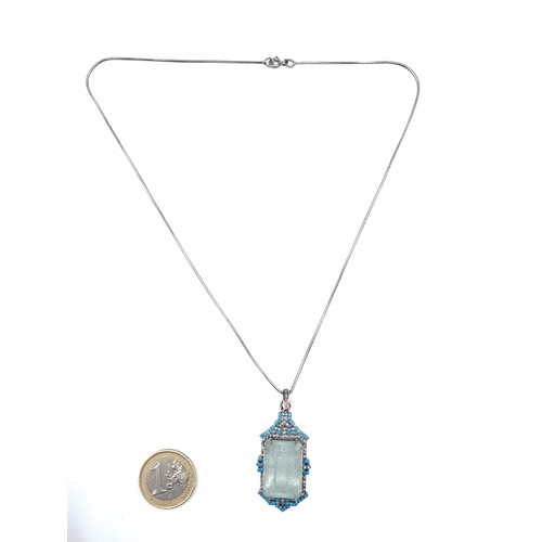 420 - A beautiful Art Deco style Aquamarine and Diamond pendant necklace, set with sterling silver and fea... 