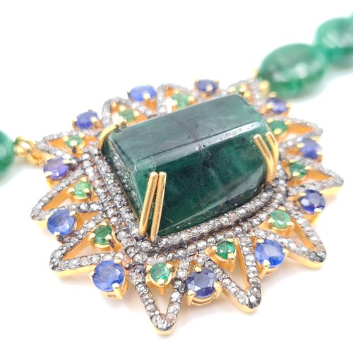 428 - Star Lot : An exceptional Emerald, Diamond and Sapphire necklace, with a striking centre stone of 45... 