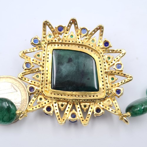 428 - Star Lot : An exceptional Emerald, Diamond and Sapphire necklace, with a striking centre stone of 45... 