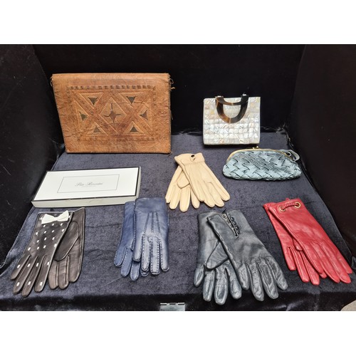 308 - A large box of vintage ladies accessories, Including five pairs of genuine leather gloves. Including... 