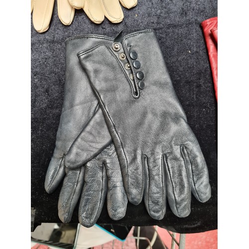 308 - A large box of vintage ladies accessories, Including five pairs of genuine leather gloves. Including... 