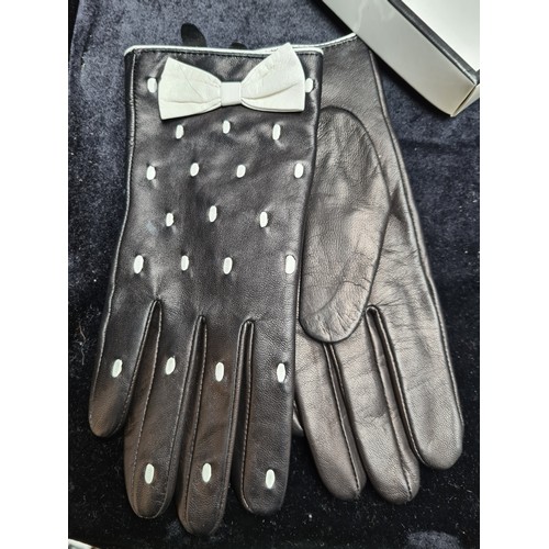 308 - A large box of vintage ladies accessories, Including five pairs of genuine leather gloves. Including... 