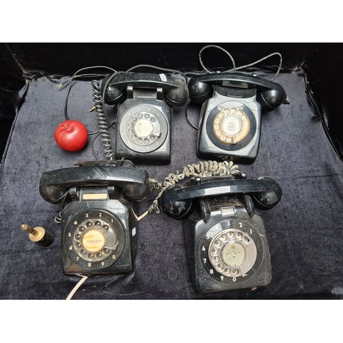 326 - A large box of four rotary telephones. Each with a black acrylic case. including Northern Telecom an... 