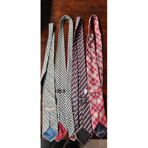 456 - A selection of seventeen ties, including examples from Gucci, Christian Dior and Reiss. In various s... 