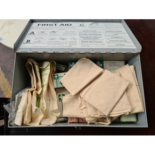 462 - A Telecom Eireann first aid kit, including contents such as bandages in original wrapping.