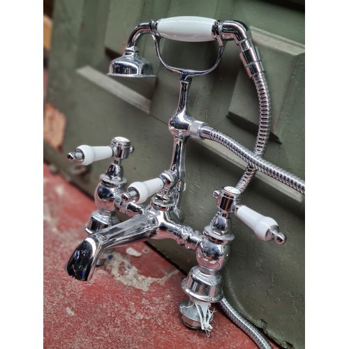 479 - A large collection of new bathroom plumbing items, including an Edwardian style bath and shower mixe... 