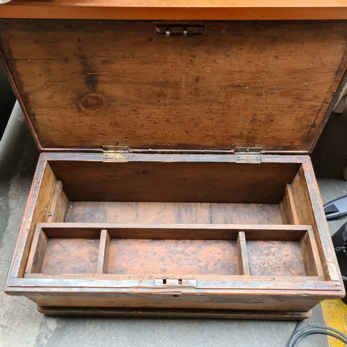 518 - A wonderful example of an antique wooden trunk, with inner shelf and iron handles. H35cm x L83cm x D... 