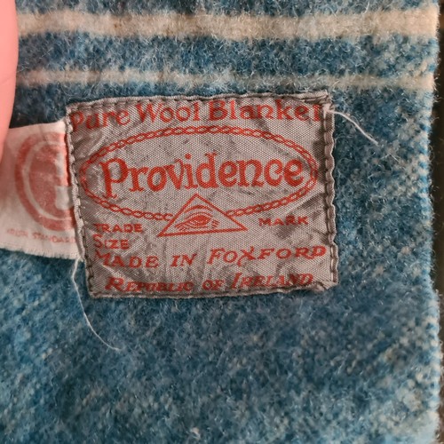 877 - A selection of eight vintage  Irish and other wool blankets, including brands Providence and Whitney... 