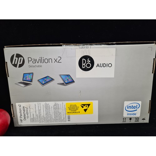 729 - A HP Pavilion x2 Detachable tablet with an attachable keyboard with 360 degree rotation, and a 10.1