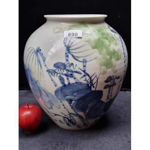 698 - A ver large heavy Chinese ceramic vase with hand painted abstract floral motifs in red, blue and gre... 