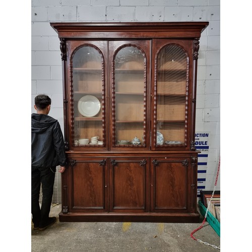 743 - Star Lot - A magnificent very tall Victorian mahogany, triple door bookcase. This is an enormous exa... 