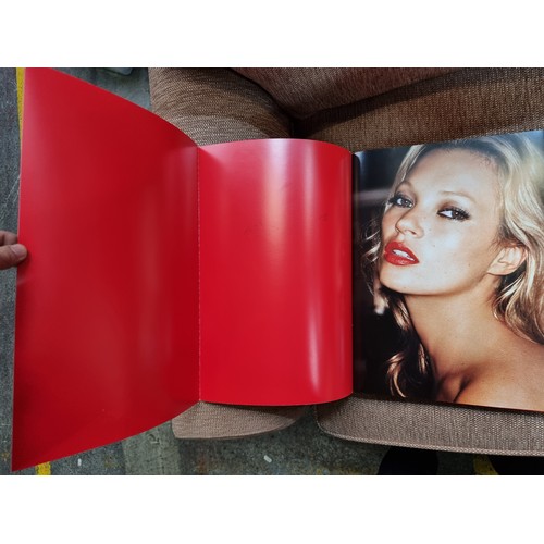 583 - Star Lot : A beautiful large collectible book of fashion photography entitled 