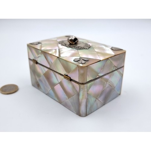 555 - Star lot: A fabulous Victorian whist card box with stunning geometric mother-of-pearl exterior and s... 