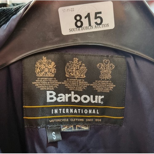 815 - A men's navy coat with a black corduroy collar by Barbour, Manufactures of Waterproof and Protective... 