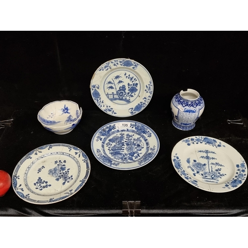 135 - Six 18th century Chinese, blue and white porcelain dishes, including four plates with staple repair,... 