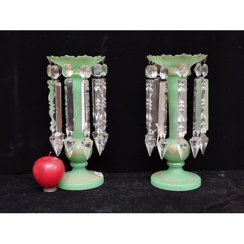 152 - A pair of Victorian lustre vases crafted from matte green glass, designed with a beautiful array of ... 