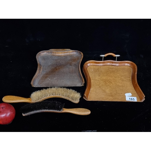 165 - A pair of Victorian crumb trays, including a nice example with EPNS handle. Both equipped with match... 