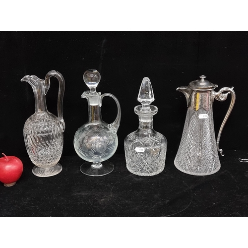 183 - Four antique beautiful crystal items including Three claret jugs including an example with EPNS lid ... 