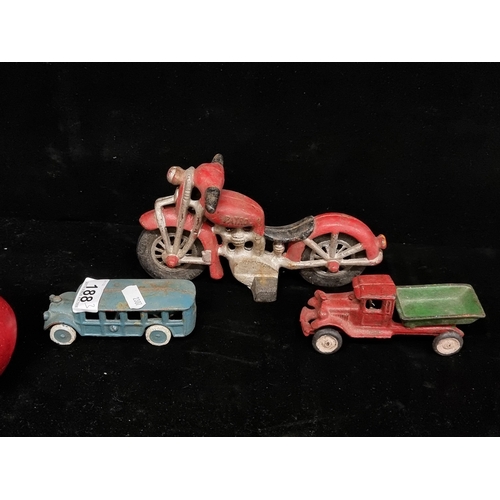 188 - Three cast metal automobiles including a school bus, an articulated truck and motorbike. Each hand p... 