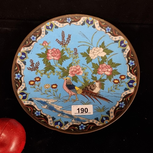 190 - A beautiful antique example of a cloisonne plate, a very striking design on a rich blue background d... 