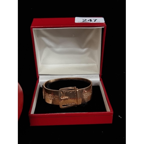 A very elegant vintage friendship cuff bracelet in a belt buckle form. Crafted in a 22ct gold plate on a copper core. A very striking example. In presentation box.