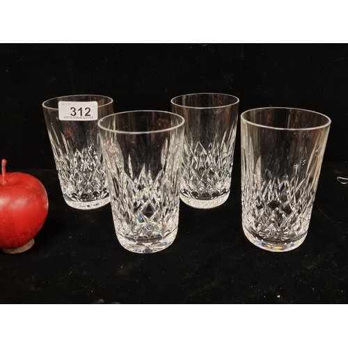 312 - Four matching Waterford Crystal tumbler glasses in the Lismore pattern. In very good condition.