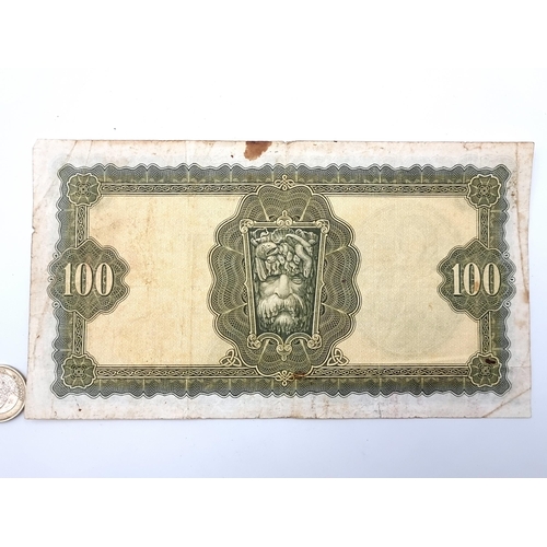 35 - Star lot : An excellent Lady Lavery 100 pound bank of Ireland note, dated 4/4/77. In good condition.