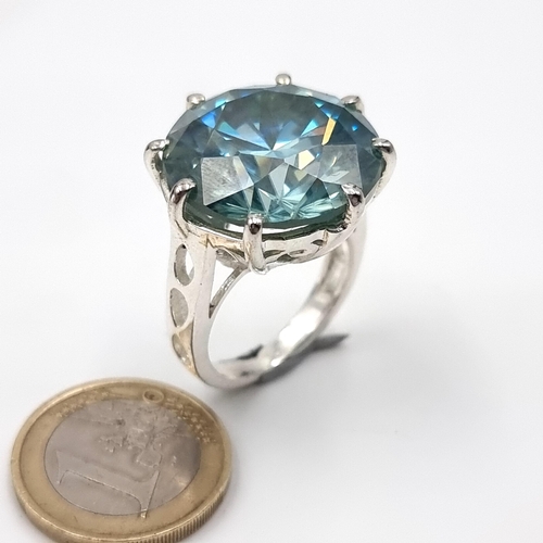 38 - A show stopping large Ocean Blue Moissanite stone ring, of a truly impressive 38 carats. Set in ster... 