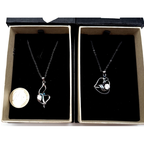 404 - Two sterling silver as new Isabella designer gem set pendant necklaces, including a pretty floral wr... 