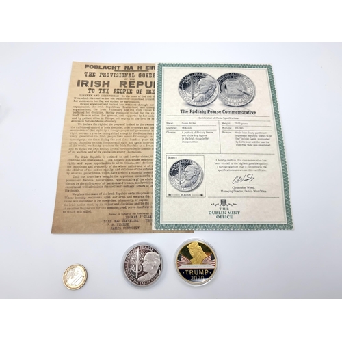 57 - Tw commemorative coins, including a presentation Padraig Pearce commemorative example, which is acco... 